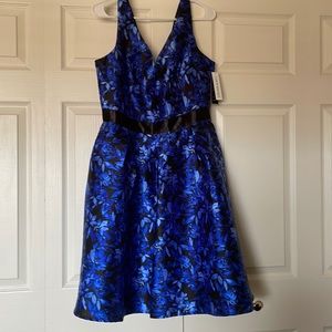 Special Occasion Dress, Blue/Black Flower print. Size 14. New with tags on.